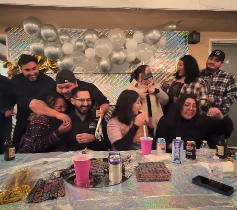 Robyn Brown and Alejandro Castillo's family hugging